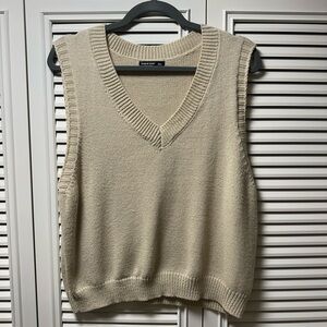 Beige sweater vest